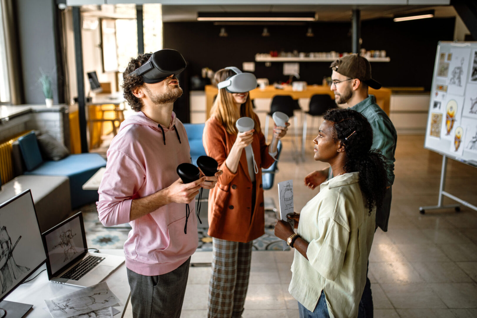 People using virtual reality headsets in office.